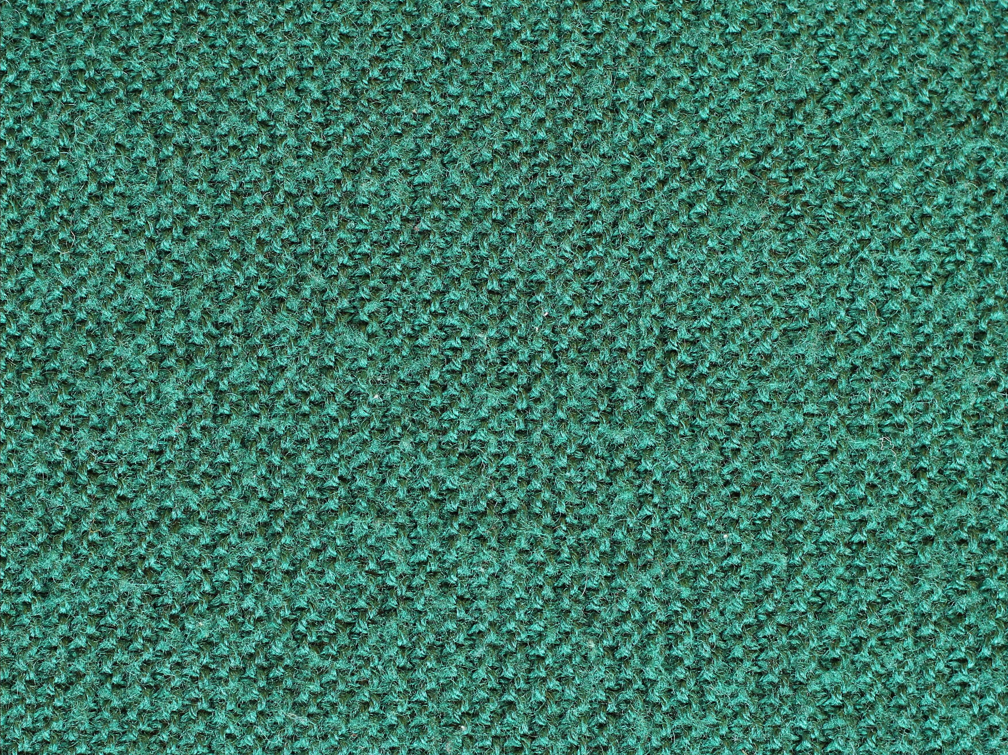 Green knitted wool texture background image